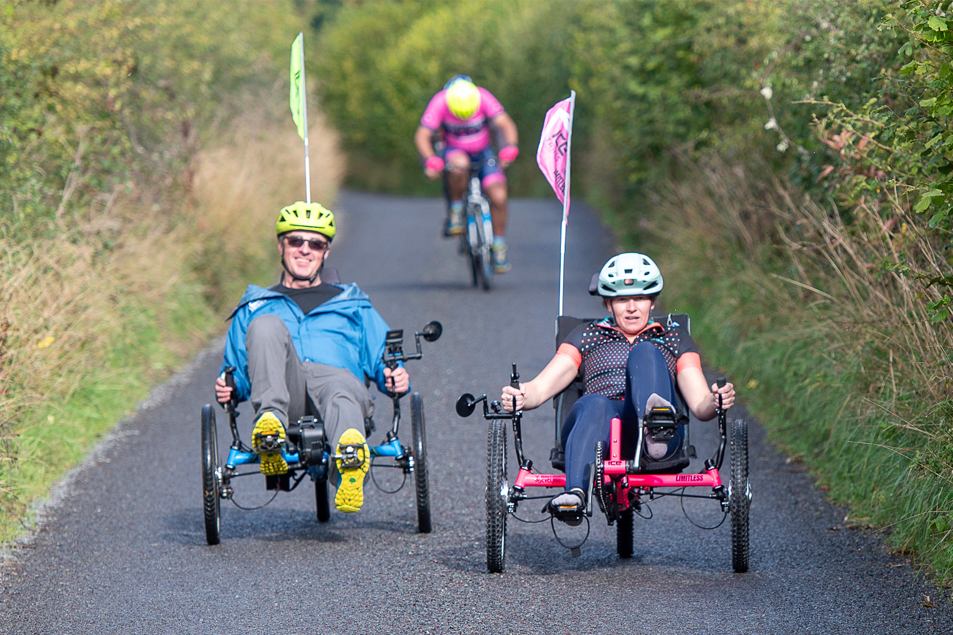 Two trike riders